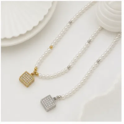 Pearl necklaces with pavé square pendants 84991-01
