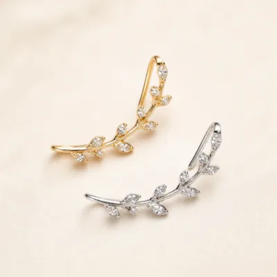 Ear cuffs de folhas com cristais em dourado e prateado