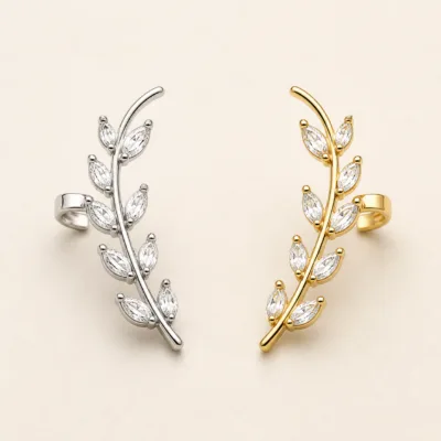 Ear cuffs de ramo com cristais em prateado e dourado