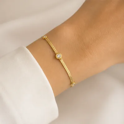 Gold four-crystal bracelet 85201-06 worn on wrist