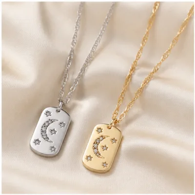 Crescent moon necklaces on cream fabric 85212-01