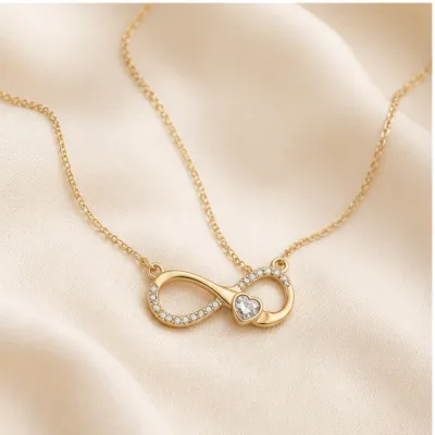 Colar infinito dourado sobre tecido marfim 85213-02