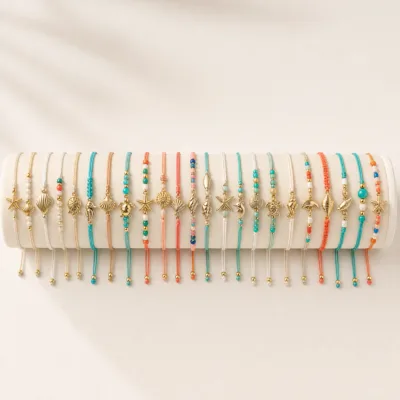 Conjunto completo de 24 pulseiras de cordão com berloques marinhos