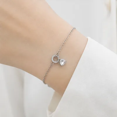 Silver heart charm bracelet 85390-2 worn on wrist