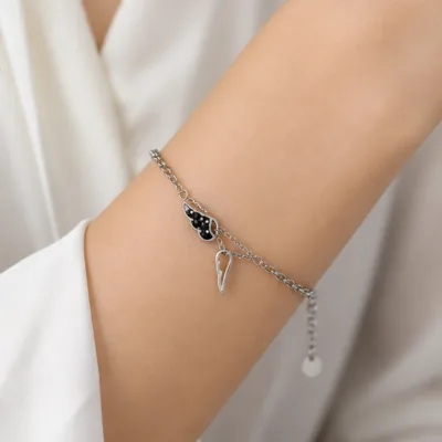 Silver twin wing bracelet 85390-3 worn on wrist