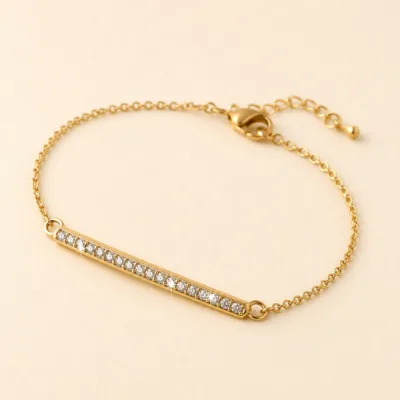Detalhe da barra de strass da pulseira dourada 85480-1