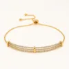 Pulseira Dourada Tripla com Strass — Dourado