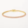 Pulseira Dourada com Cristais Rosa — Dourado e rosa