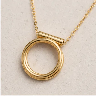 Close detail of gold double-ring pendant necklace 85542-1