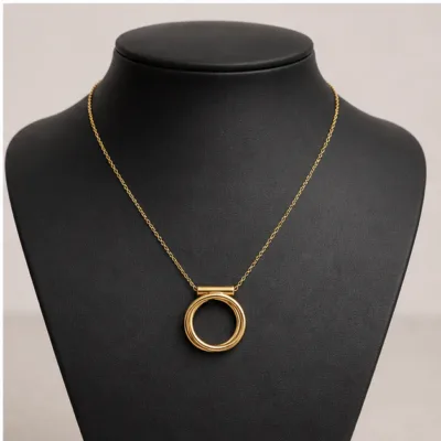 Gold double-ring necklace 85542-1 on black jewelry bust