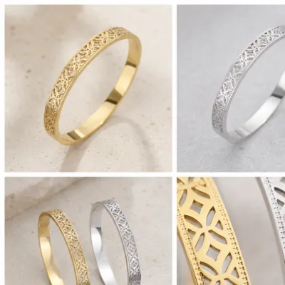 Pulseira Rígida em Aço com Padrão Floral Vazado — Dourado