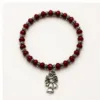 Pulseira vermelha de cristais 20 mm com pendente de menina