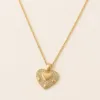 Colar dourado com coração e zircónias