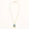 Colar dourado com medalhão de olho azul e três medalhas