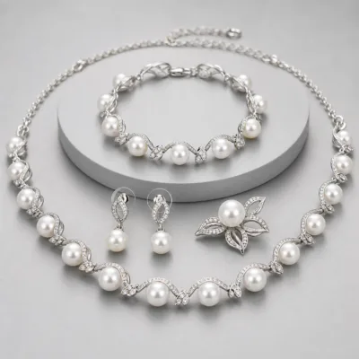 Conjunto de pérolas com acabamento prateado