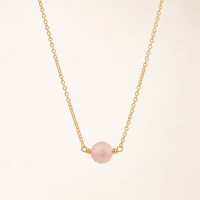 Colar dourado em aço com pedra natural rosa