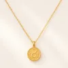 Colar dourado em aço com medalhão do zodíaco